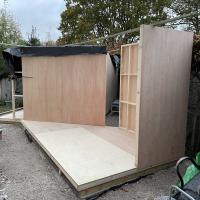 Cedar clad home office and storage shed